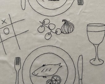 Hand embroidered dinner for 4  linen table  cloth with plates  , mediterenian food   - 4 seats with plates allocation  . Black on white