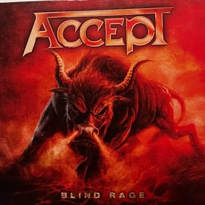 May include: A red album cover with the band name "ACCEPT" in gold letters. A red bull with horns is in the center of the cover, breathing fire. The text "BLIND RAGE" is at the bottom of the cover.