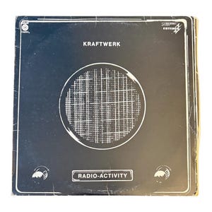 May include: A set of three ceramic mugs with a speckled, matte finish. The mugs are in shades of cream, light gray, and dark gray. Each mug has a simple, minimalist design, perfect for coffee or tea.