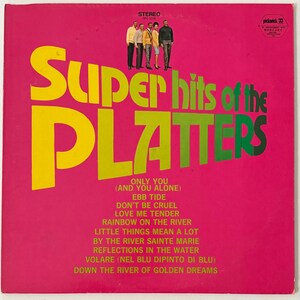 May include: A pink vinyl record album cover with the title "Super hits of the Platters" in yellow and green letters. The album cover features a group of six men in black and white suits and a woman in a white dress. The album cover lists the songs "Only You (And You Alone)", "Ebb Tide", "Don't Be Cruel", "Love Me Tender", "Rainbow On The River", "Little Things Mean A Lot", "By The River Sainte Marie", "Reflections In The Water", "Volare (Nel Blu Dipinto Di Blu)", and "Down The River Of Golden Dreams".