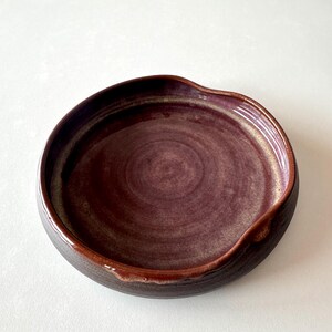 Asymmetrical Ceramic Plate – Burgundy Red Glaze on Black Stoneware, Handmade 9.5–10” Plate