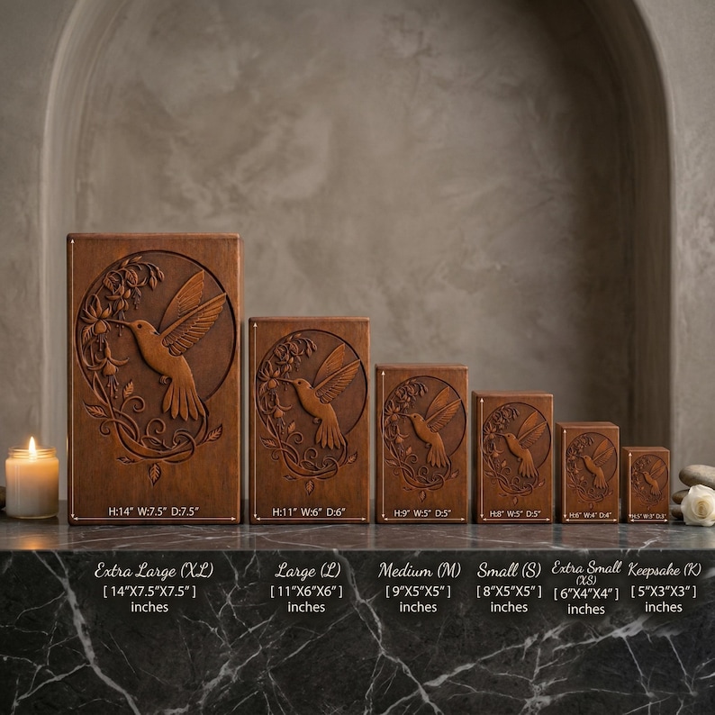 May include: A collection of six wooden boxes of varying sizes, each featuring a detailed hummingbird design. The boxes range from Extra Large (14"x7.5"x7.5") to Extra Small (5"x3"x3"). The hummingbird is carved within a circular frame.