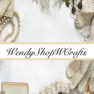 May include: A white background with a banner that reads "Wendy Shop W Crafts". The banner is surrounded by white lace, pearls, and a vintage-style photo frame.