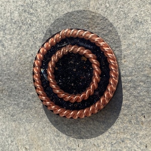 Pocket orgonite with twin tensor rings