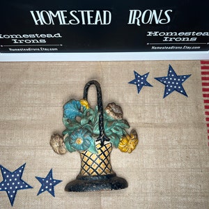 Flower basket cast iron door stop