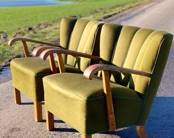 A rare pair of highly sought after vintage Danish lounge chairs.  FREE SHIPPING for these chairs.