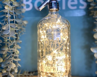 Soda Syphon, Pinks | Mains Powered LED Bottle Light Filled With 100 Warm White Lights