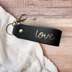 Black leather keychain with gold lettering &quot;love&quot;