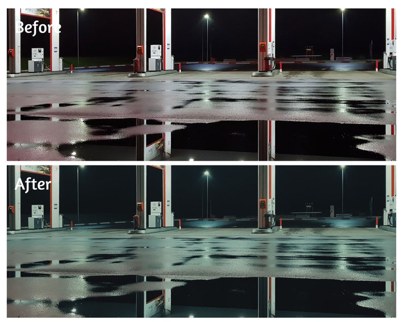 May include: A nighttime view of a gas station with two fuel pumps and a streetlight. The ground is wet from rain and reflects the lights. The gas station is empty.