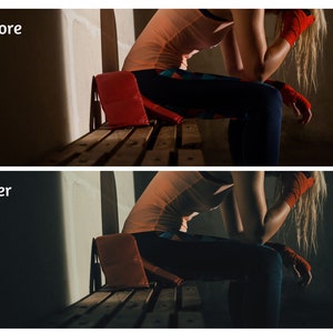 May include: A woman wearing red boxing wraps sits on a wooden bench in a dimly lit room. She is wearing a pink tank top and blue pants.