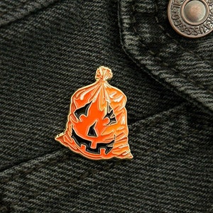 Nostalgic Jack-O-Lantern Trash Bag Enamel Pin - Halloween Inspired - Quirky Vintage-Style Lapel Pin - Spooky Festive Accessory