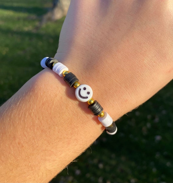 Black Clay Beaded Bracelet with Black and Gold Happy Face Charm