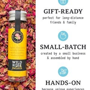 May include: A glass jar of wild rose petals with a silver lid and a black label. The label reads "Wild Rose Petals" and "light, floral & mildly bitter with earthy undertones." The jar is surrounded by dried rose petals. The text "Gift-Ready", "Small-Batch", and "Hands-On" is also visible.