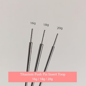 May include: Three silver-colored titanium push pin insert tools, labeled 16g, 18g, and 20g. The tools are displayed against a light background, with the text "Titanium Push Pin Insert Toop 16g / 18g / 20g" in a pink rectangle.