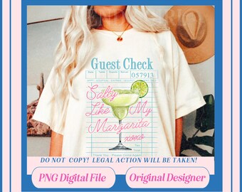 May include: A white t-shirt featuring a pink graphic of a margarita glass with the text "Salty Like My Margarita" on a lined paper background. The text "Guest Check" is at the top of the graphic. The text "DO NOT COPY! LEGAL ACTION WILL BE TAKEN!" is at the bottom of the graphic. The text "PNG Digital File" and "Original Designer" are at the bottom of the image.