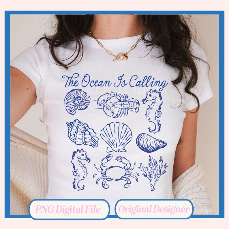 May include: A white t-shirt with the text "The Ocean Is Calling" in blue lettering. The shirt features a variety of blue illustrations of seashells, a lobster, a seahorse, an oyster, a crab, and seaweed.