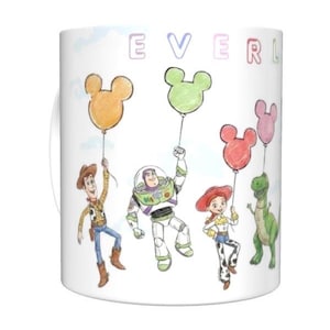 May include: A set of three ceramic mugs with a speckled, matte finish. The mugs are in shades of cream, gray, and black. Each mug has a simple, minimalist design, perfect for coffee or tea. The mugs are stacked on top of each other.