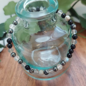 I am secure - morse code intention bracelet with black onyx, selenite, labradorite, spider web jasper, and hematite