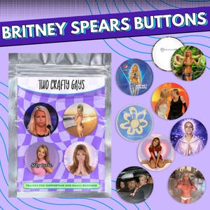 May include: A collection of Britney Spears buttons featuring various images of the singer. The buttons are round and colorful, with images from her music videos and photoshoots. The buttons are packaged in a clear bag with the text "TWO CRAFTY GAYS".