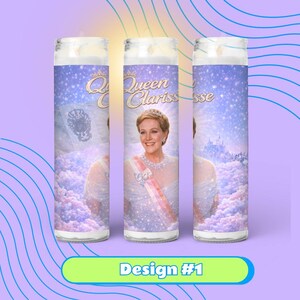Three candles with the same design featuring a woman in a tiara and a castle in the background.