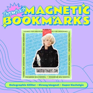 May include: A purple and blue graphic featuring the words "Throwback Magnetic Bookmarks." A central sticker shows a woman with white hair. The sticker reads "TwoCraftyGays.com" and "Thanks for Ordering!" with the words "Holographic Glitter, Strong Magnet, Super Nostalgic."
