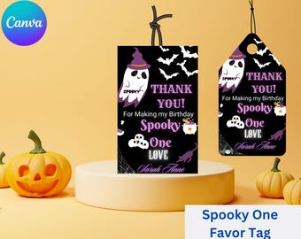 May include: Halloween-themed favor tags with a black background, featuring a ghost wearing a witch hat, bats, and the text "Thank You!" and "Spooky One Love." The tags are displayed with pumpkins.