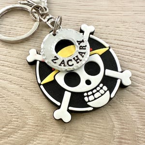 One Piece keychain with custom name stamped