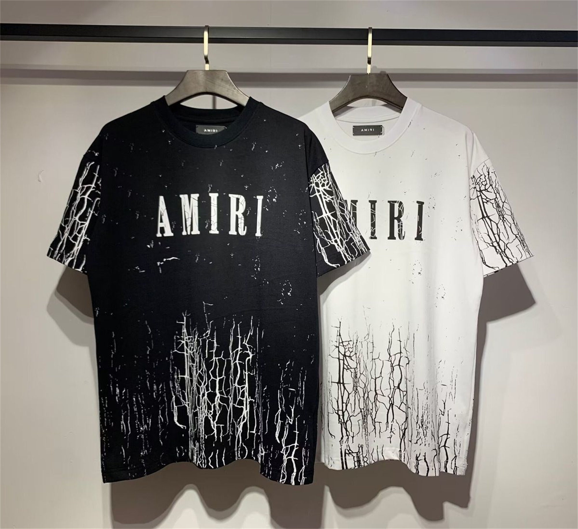 Amiri Splatter-paint Logo-print Cotton T-shirt in Black for Men