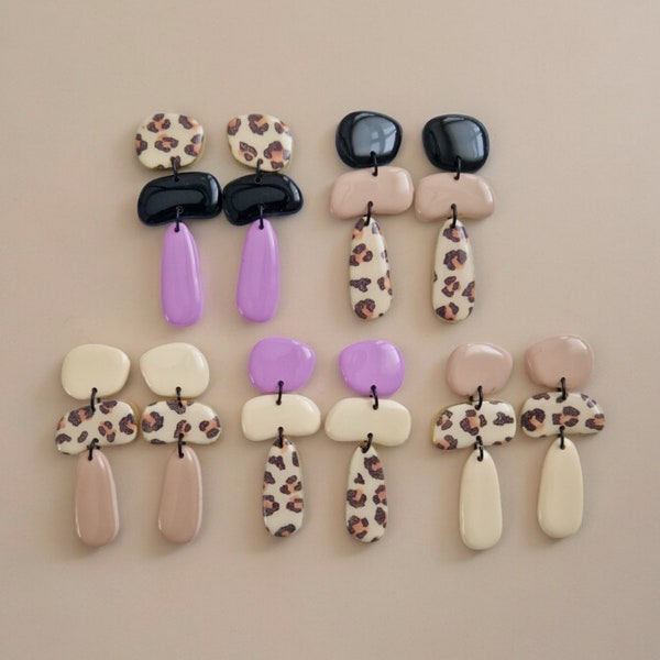 Three-piece Pebbles Leo pattern polymer clay earrings cream black lilac asymmetrical geometric shapes stainless steel studs Cheetah