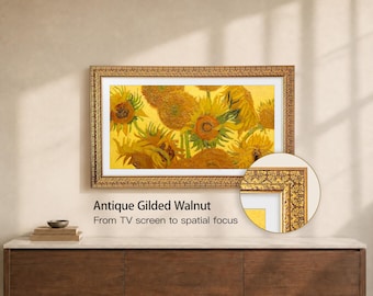May include: A rectangular television screen displaying a painting of yellow sunflowers, encased in an ornate antique gilded walnut frame with a detailed relief pattern. A circular inset shows a close-up of the frame's intricate gold texture.