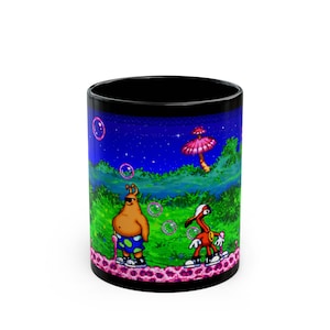May include: Black ceramic mug with a vibrant cartoon design. The illustration shows two animated characters, bubbles, and a mushroom against a starry blue sky. The mug has a pink and white patterned base.