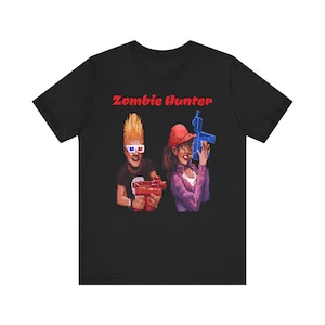 Zombies Ate My Neighbours Zombie Hunter SNES Halloween 90's Videogioco Pixel Art Maglietta unisex Ottimo regalo per giocatori e collezionisti retrò