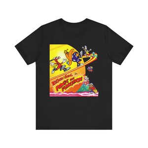 May include: Black t-shirt featuring a colorful cartoon graphic. The graphic includes the text "Totsam & Garg in PANIC ON FUNKOTRON" with various animated characters in a vibrant, dynamic scene. The design is set against a yellow and orange background.