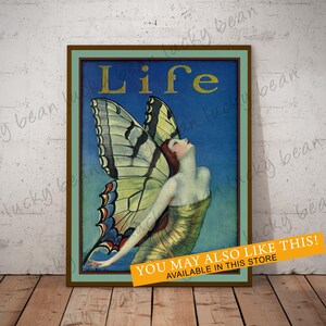 May include: A vintage magazine cover featuring a woman with butterfly wings against a blue background. The magazine title "Life" is printed in gold lettering.