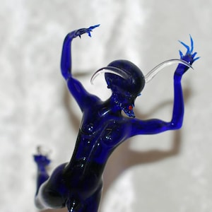 Statuette of a mythological figure in Murano glass