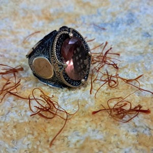 the mammon ring of wealth