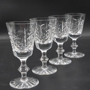 Set of 4 Edinburgh Crystal Highland pattern Crystal sherry or liqueur glasses 75ml. 11.5cm tall