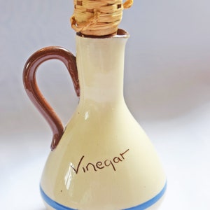 RARE FIND St. Marychurch Pottery Torquay  Vinegar Bottle  
Condition: As new.  Used for display only.  No chips, cracks or crazing.

Height: 14cms
Width: 8cms