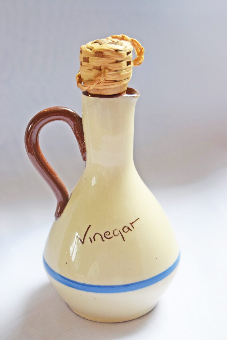 RARE FIND St. Marychurch Pottery Torquay  Vinegar Bottle  
Condition: As new.  Used for display only.  No chips, cracks or crazing.

Height: 14cms
Width: 8cms