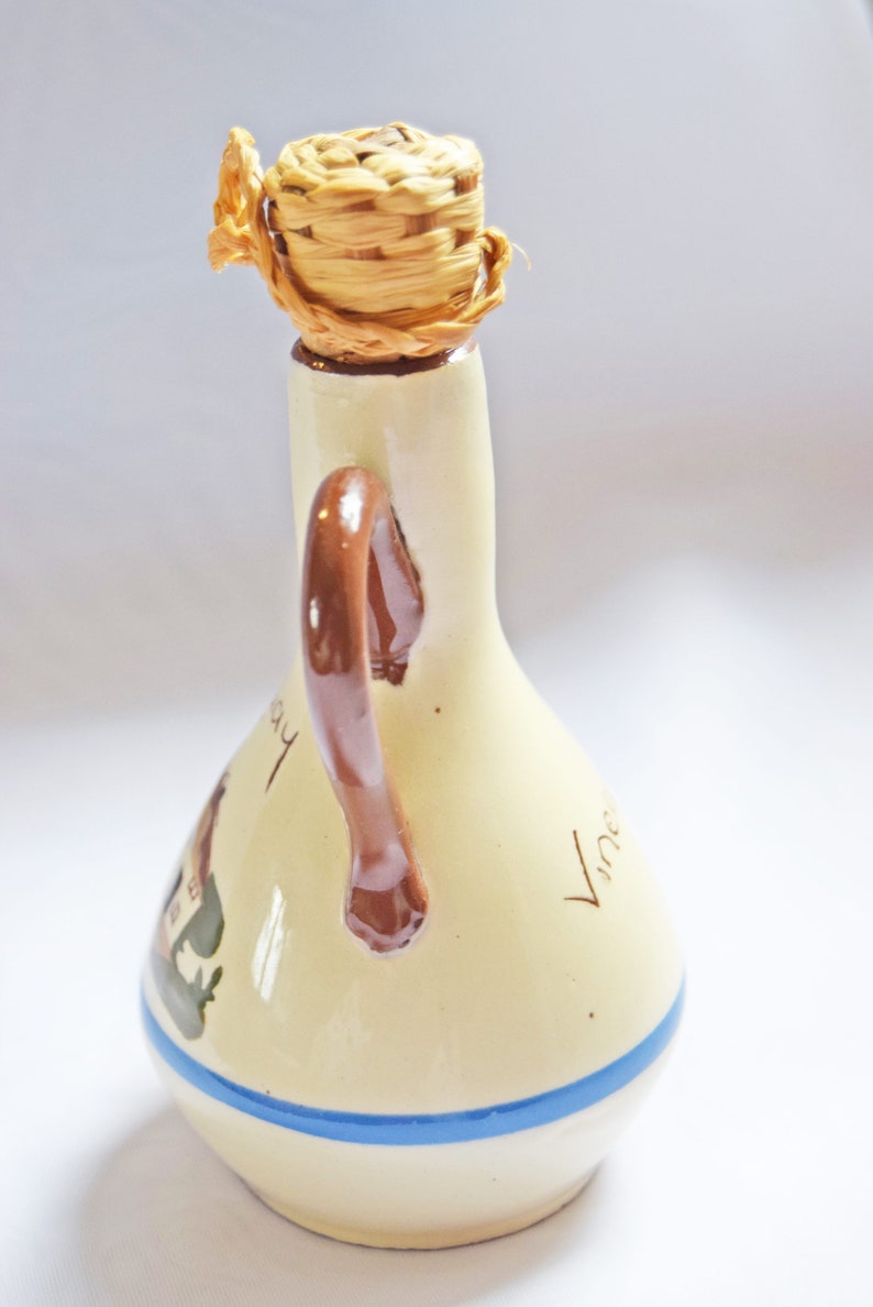 RARE FIND St. Marychurch Pottery Torquay  Vinegar Bottle  
Condition: As new.  Used for display only.  No chips, cracks or crazing.

Height: 14cms
Width: 8cms