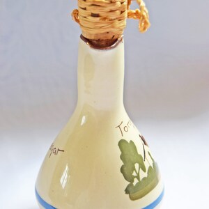 RARE FIND St. Marychurch Pottery Torquay  Vinegar Bottle  
Condition: As new.  Used for display only.  No chips, cracks or crazing.

Height: 14cms
Width: 8cms