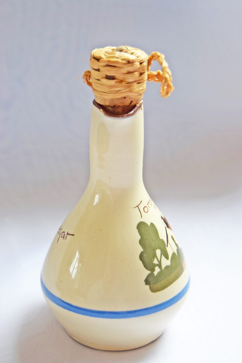 RARE FIND St. Marychurch Pottery Torquay  Vinegar Bottle  
Condition: As new.  Used for display only.  No chips, cracks or crazing.

Height: 14cms
Width: 8cms