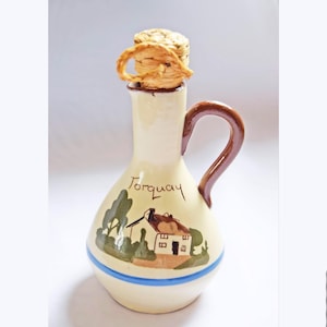 RARE FIND St. Marychurch Pottery Torquay  Vinegar Bottle  
Condition: As new.  Used for display only.  No chips, cracks or crazing.

Height: 14cms
Width: 8cms