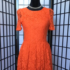 MANGO Lace Dress Bright Orange Red Color. Size XXS/XS. In New Condition with Original Tag. Bust 30” - 32”. Waist 24”- 25”. Made In Turkey.