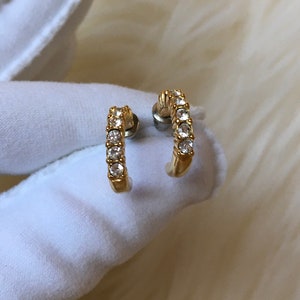 Swarovski Signed Classic Hoop Earrings. In Like New Condition.