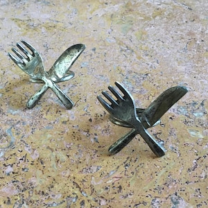 Vintage Pier 1 Imports Napkin Holders. Possible Sterling Silver. Has Good Weight. In Good Condition. Need Cleaning.