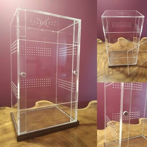 A unique enclosure /  terrarium with a wooden stand. Terrarium for tarantulas, jumping spiders, mantises, plants, flowers - magnetic doors.