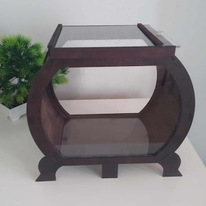 A large enclosure, unique terrarium for tarantulas, spiders, etc. Terrarium with a wooden casing. House for animals, terrarium for animals.