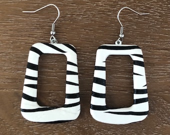 Conquer the jungle of style with these zebra print earrings, zebra earrings, a wild twist for your look