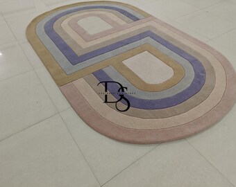 Hand Tufted Oval Wool Rug: Modern Geometric Design, Natural Dyes